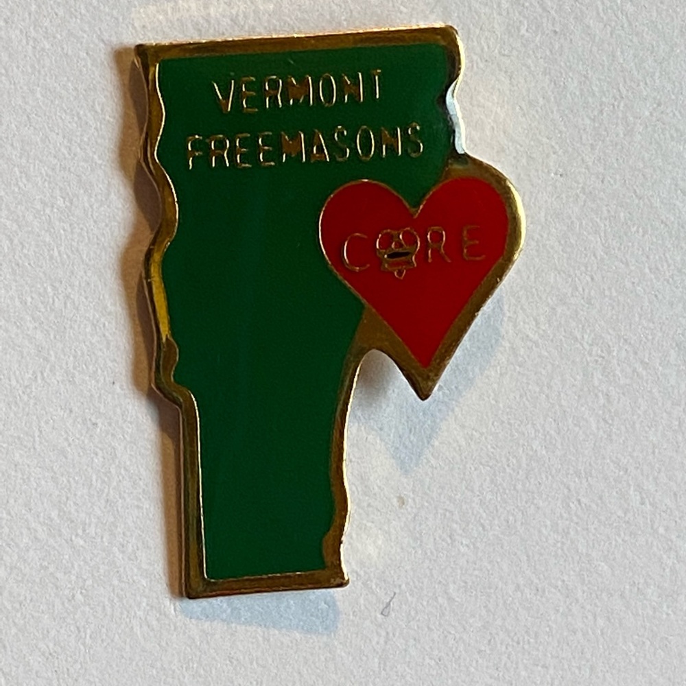 Vermont free mason pin care shaped like the state